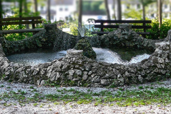 Transform Spaces with a Concrete & Gravel Water Feature